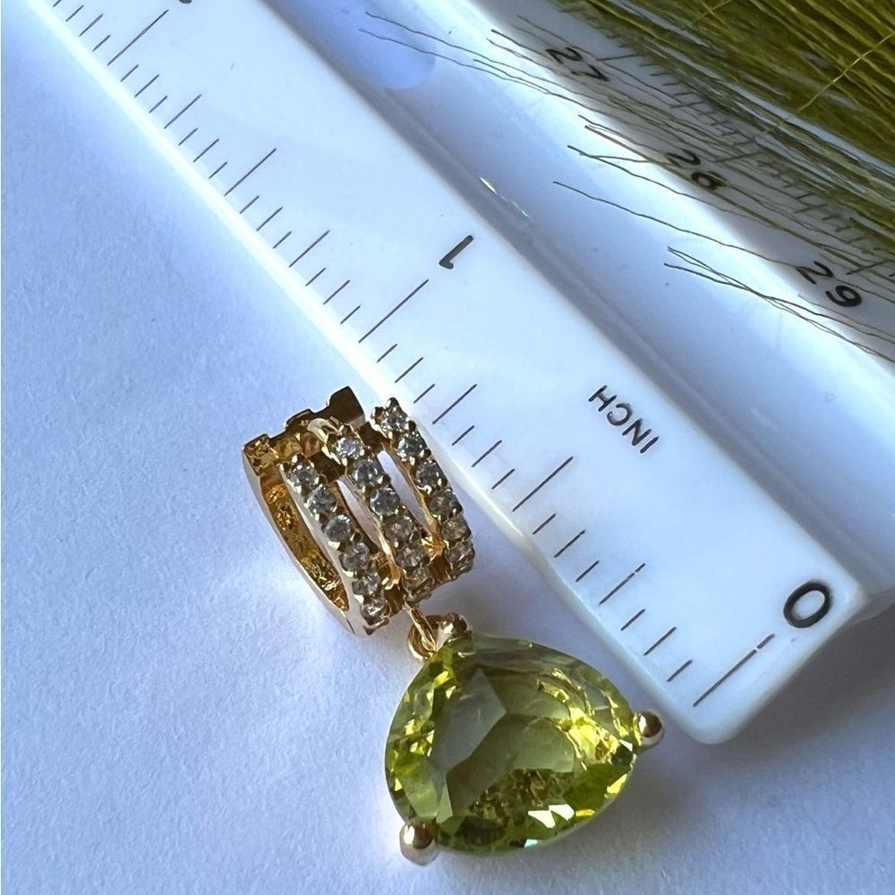 Green Peridot colored crystal earrings on gold huggie hoops. - Picture 4 of 4